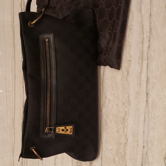 Gucci Black GG Canvas and Leather Baguette Bag at 1stDibs  gucci black baguette  bag, gucci baguette bag vintage, vintage gucci baguette bag